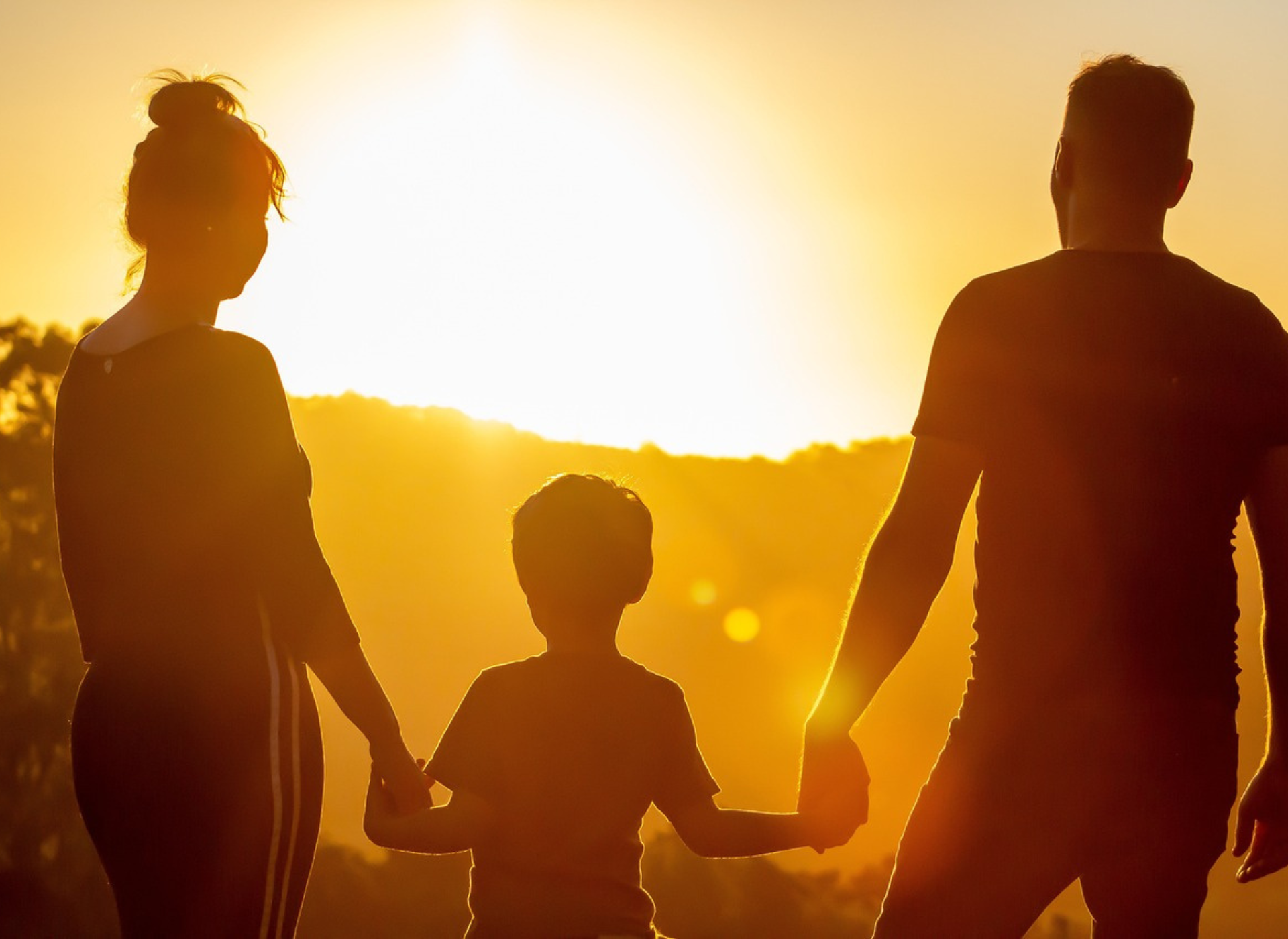 silhouettes of two adults and a child - life insurance