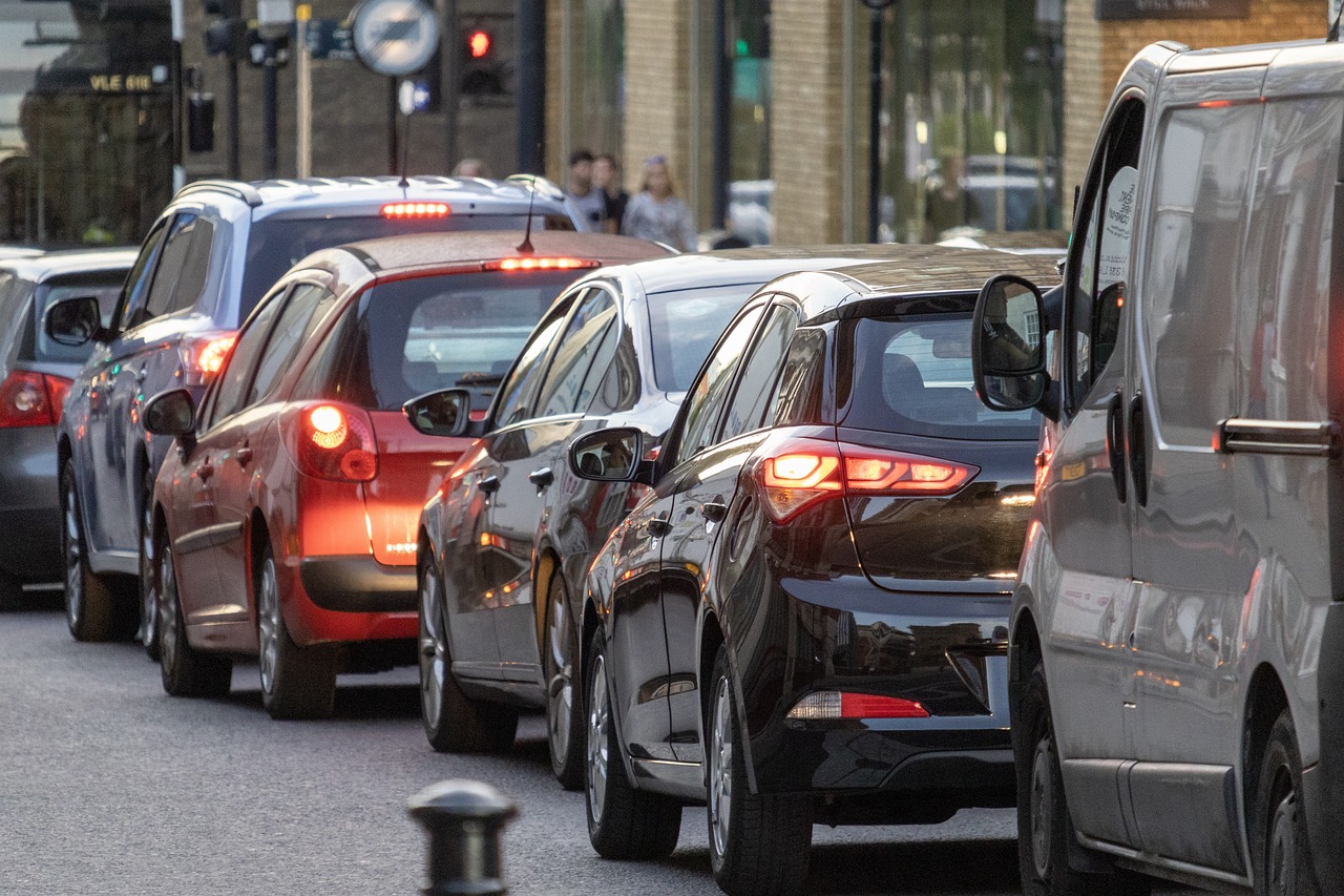 row of cars stuck in traffic - car insurance
